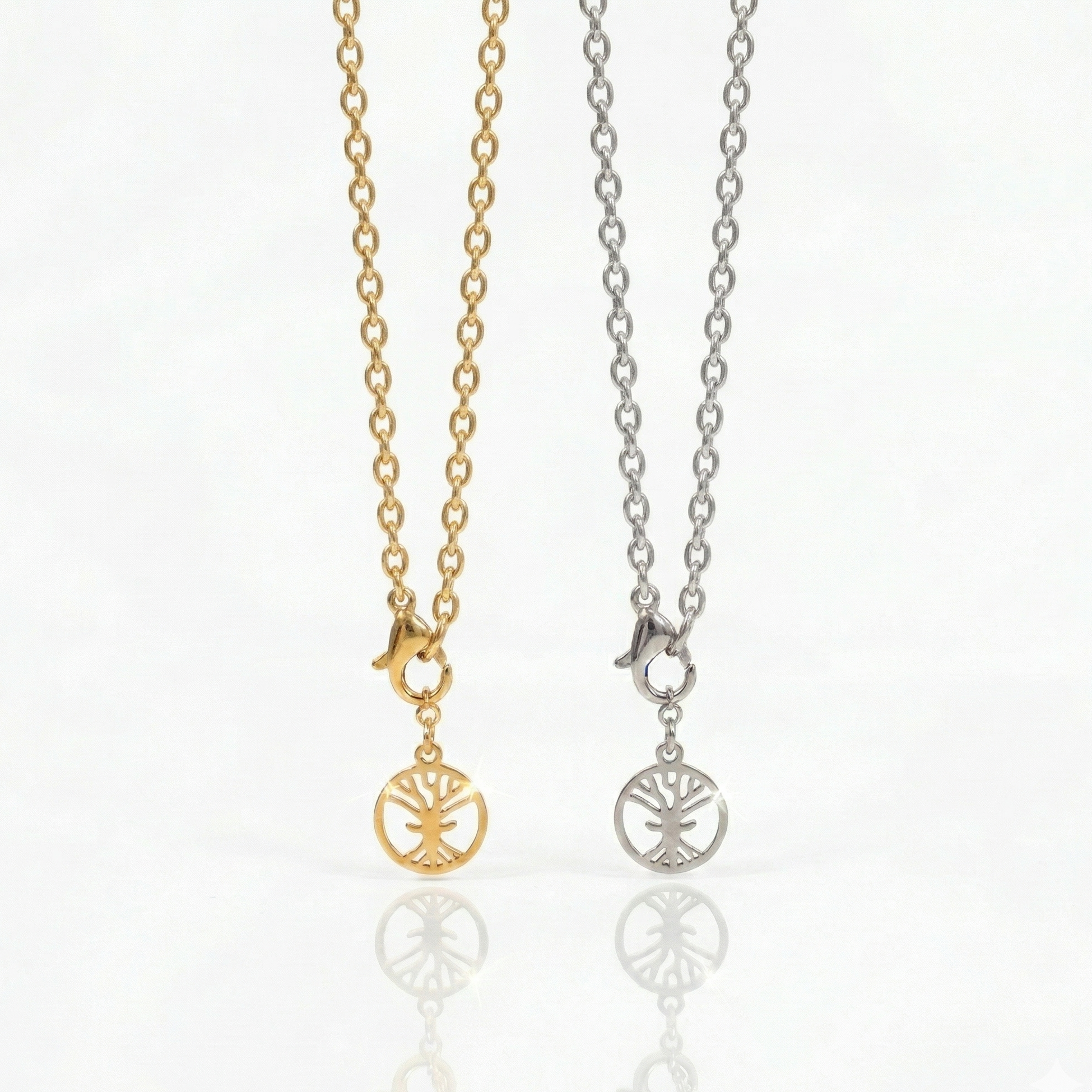 Enkelt kedjearmband i stål och guld från yggdrasil by sweden