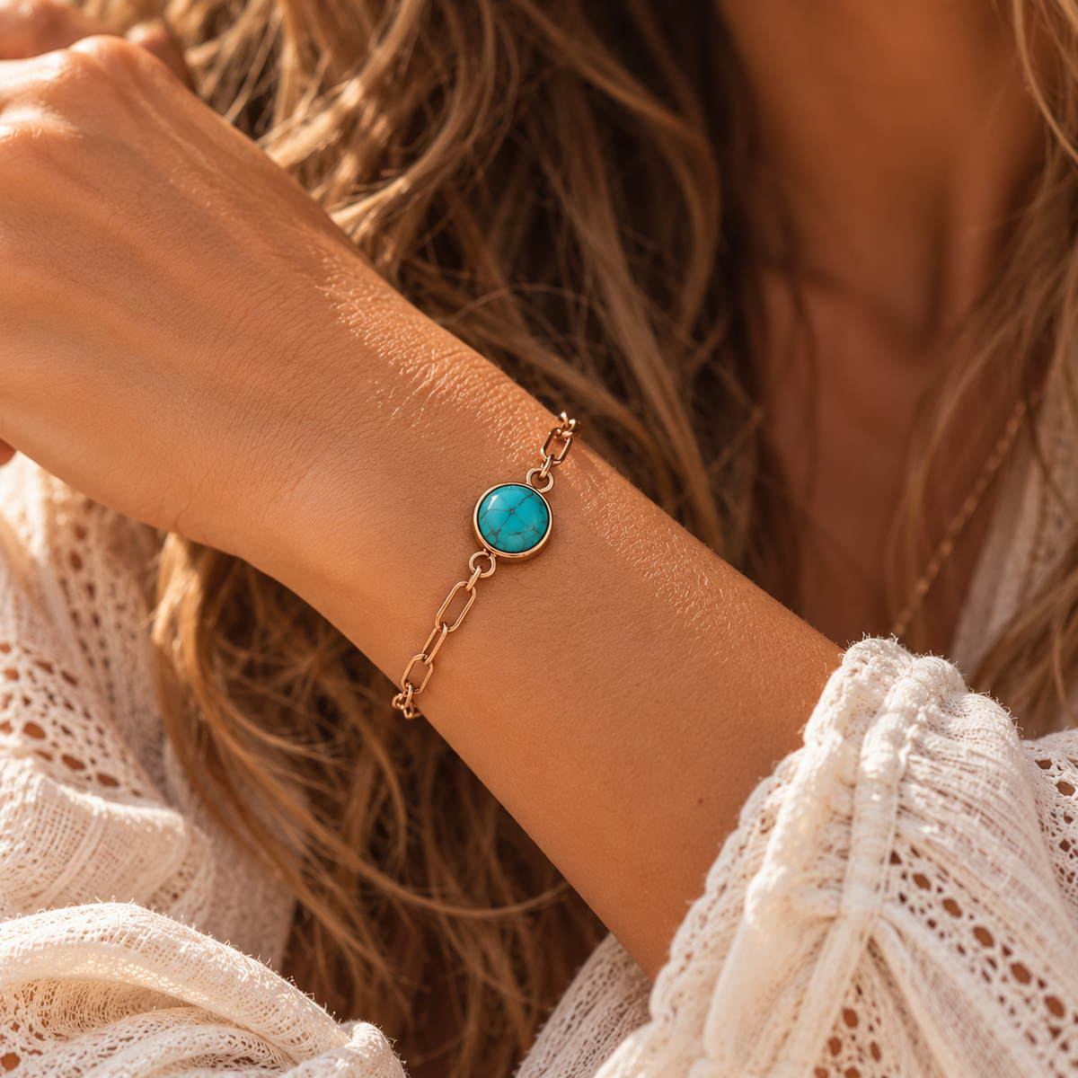Turquoise Bracelet gold on wrist, bohemian lifestyle photo